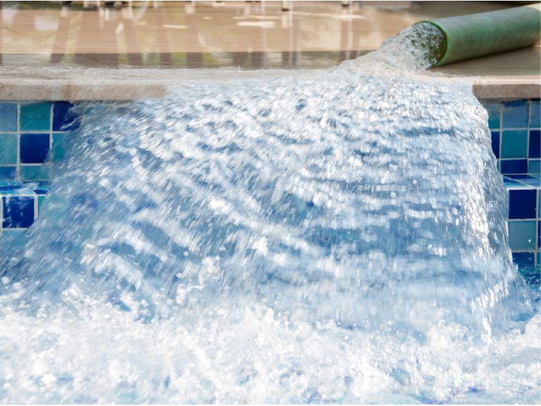 water flowing into pool