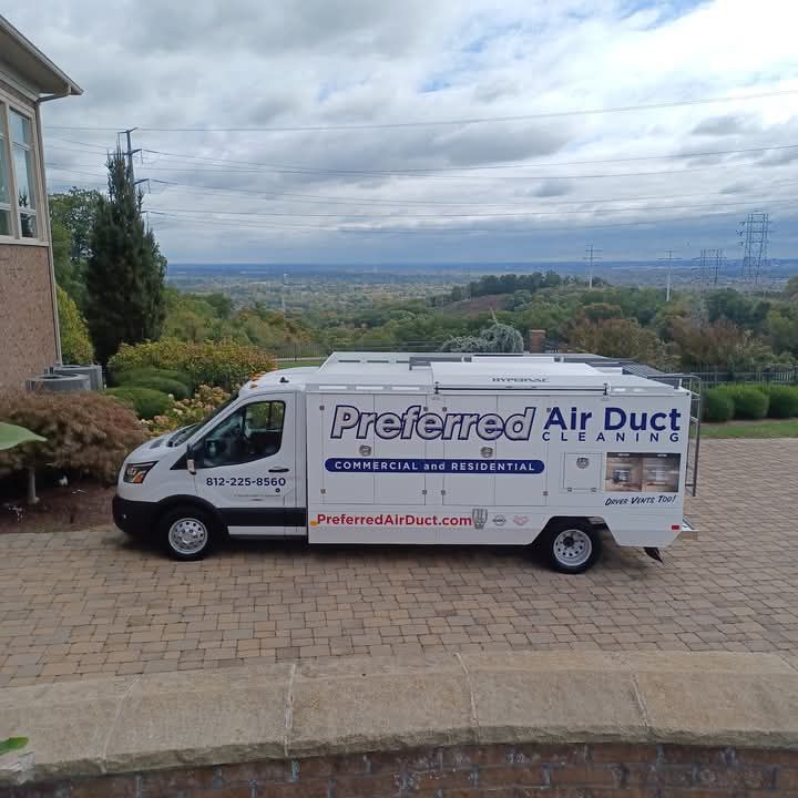 A preferred air duct cleaning van is parked in front of a house.