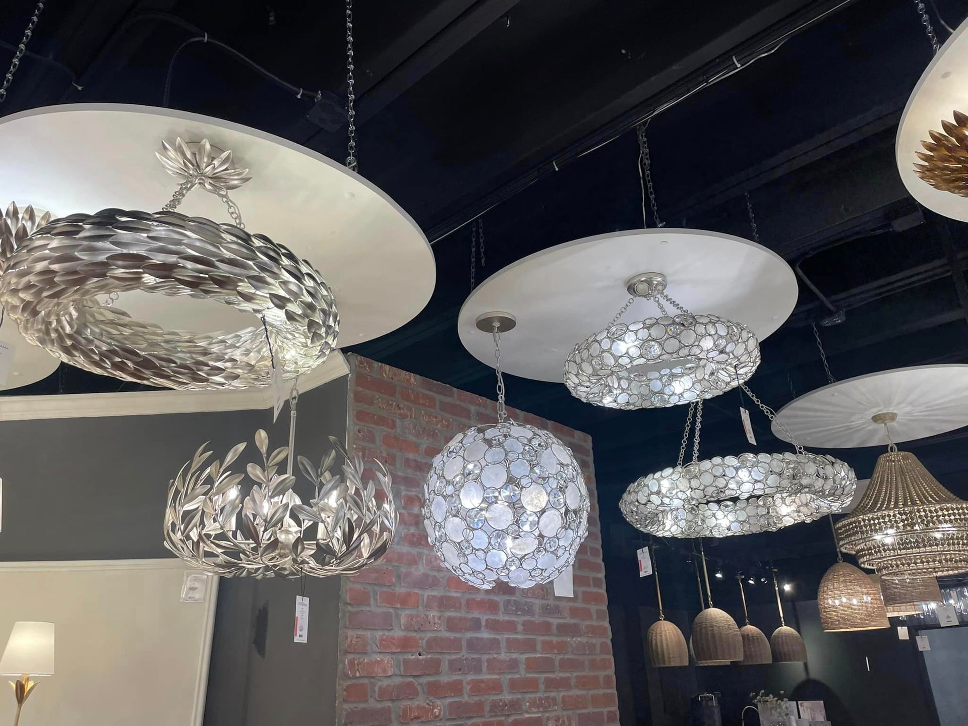 A room with a lot of lights hanging from the ceiling