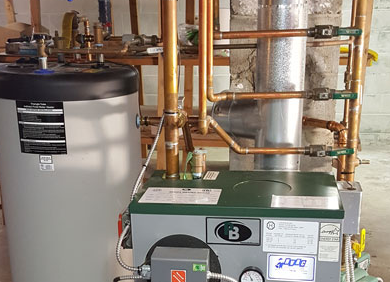 Water heater and boiler equipment with copper pipes in a utility room