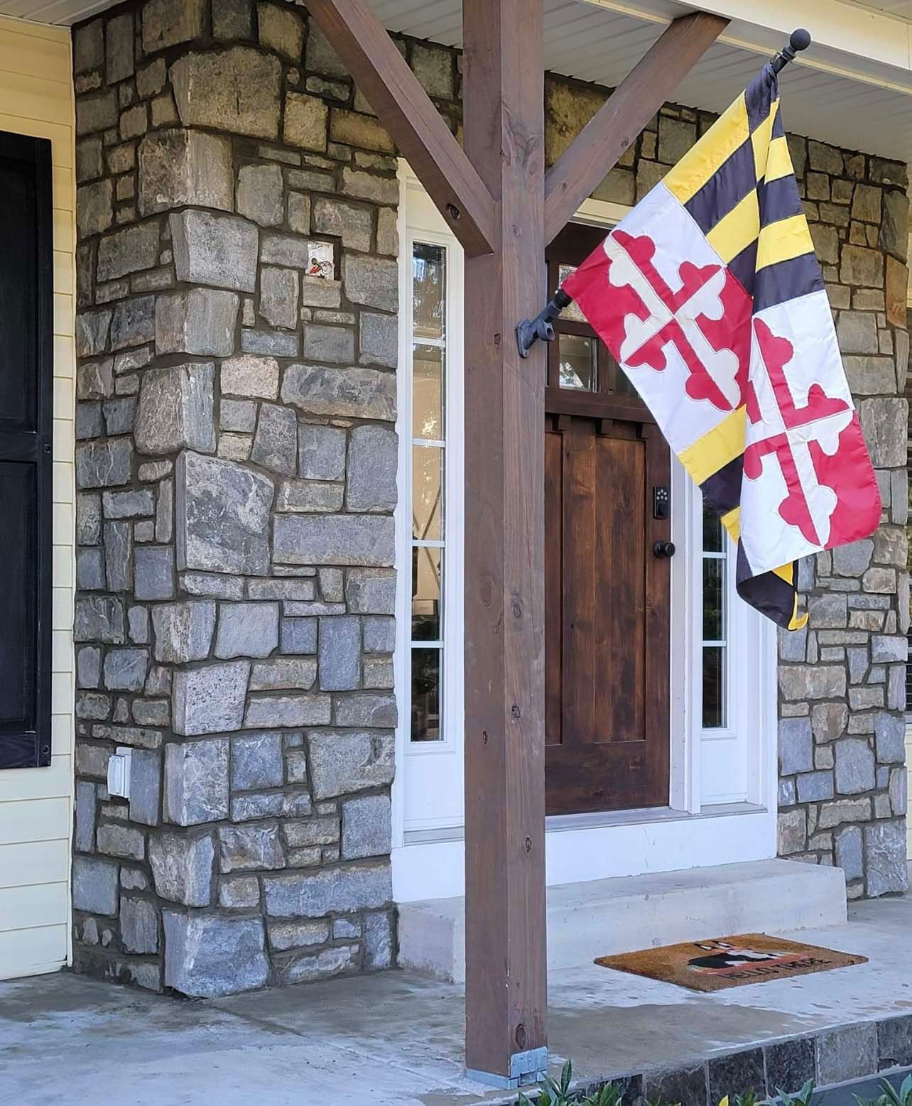 a house with a flag that says maryland on it
