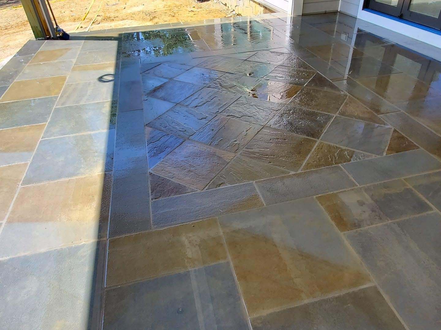 a patio with a lot of tiles on it