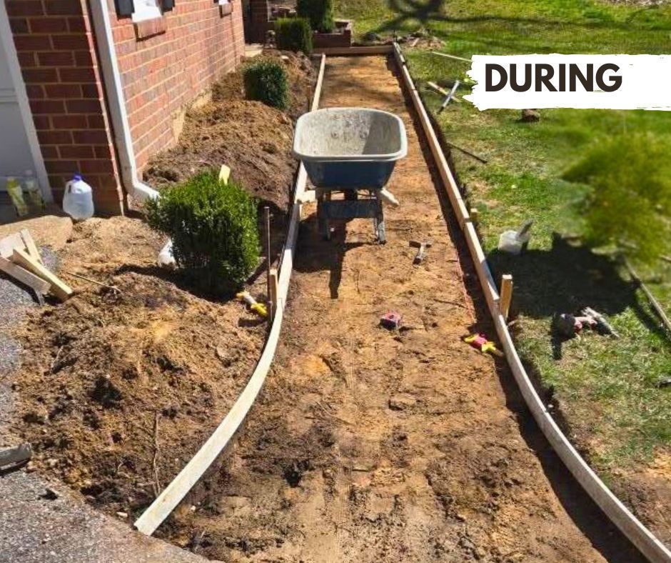 Construction of a walkway: A dirt path with wooden borders is being prepared, with a wheelbarrow and plants present.