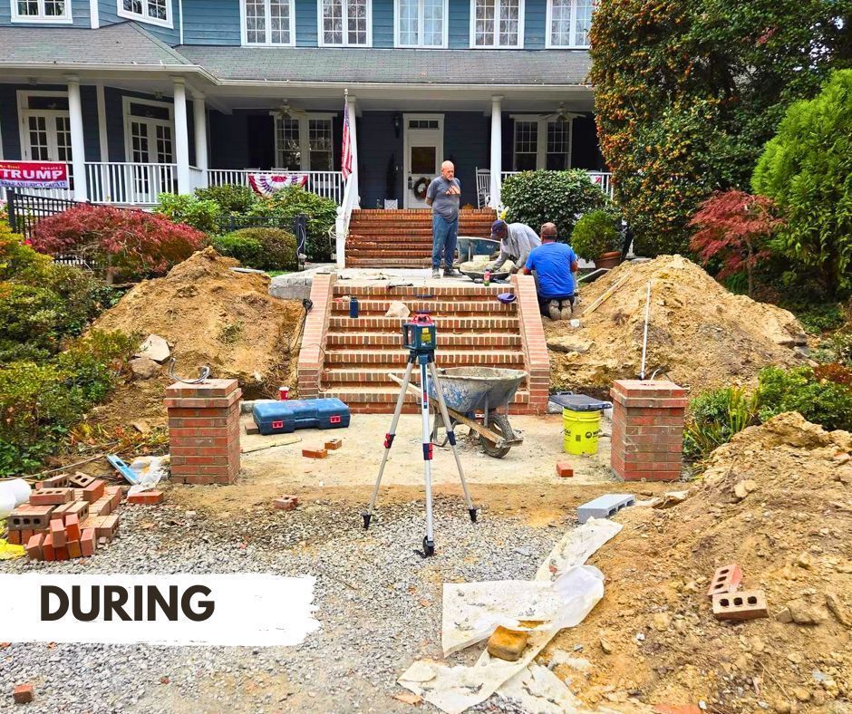 Construction of brick steps during a renovation. Workers are building the steps in front of a blue house, using a laser level.