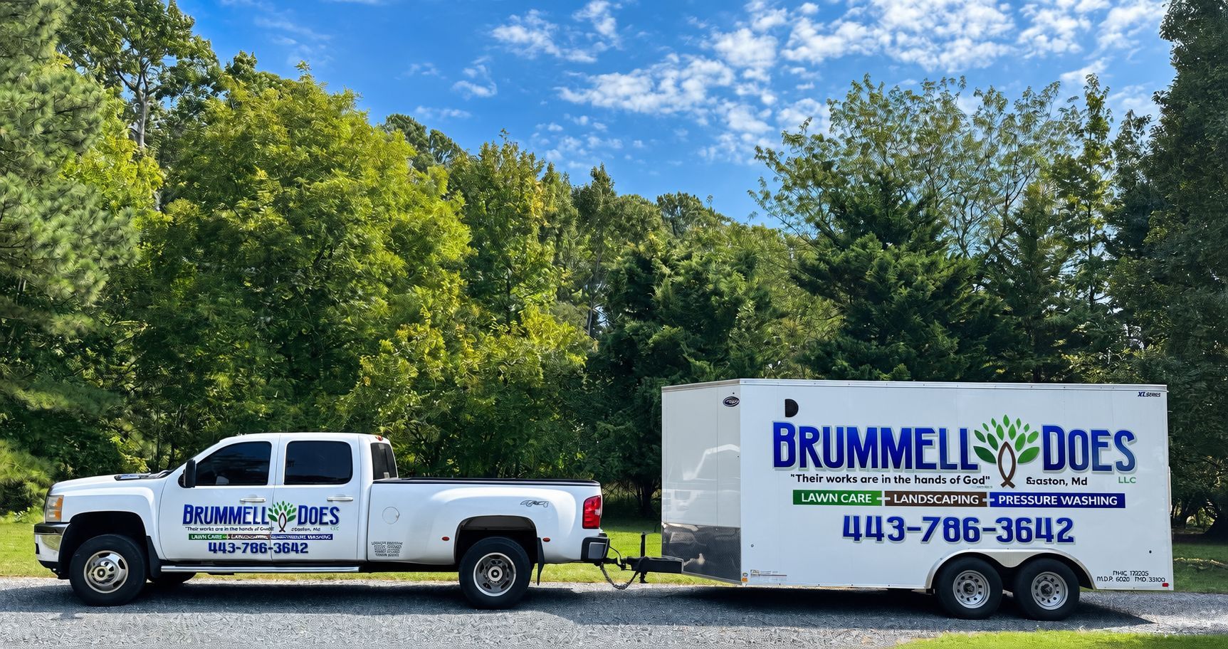 White service truck towing a Brummell Ducts trailer on a tree-lined roadside under a blue sky