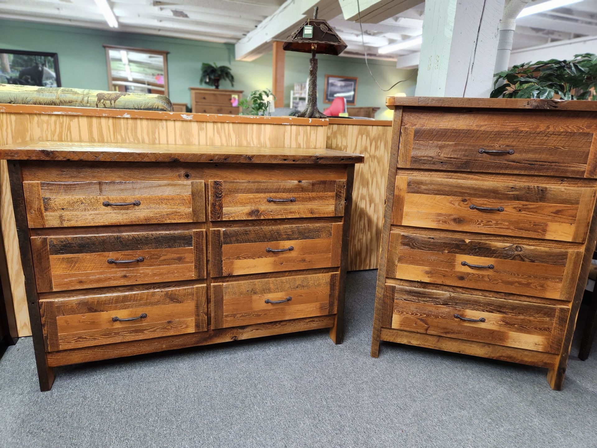 Two wooden dressers are sitting next to each other in a room.