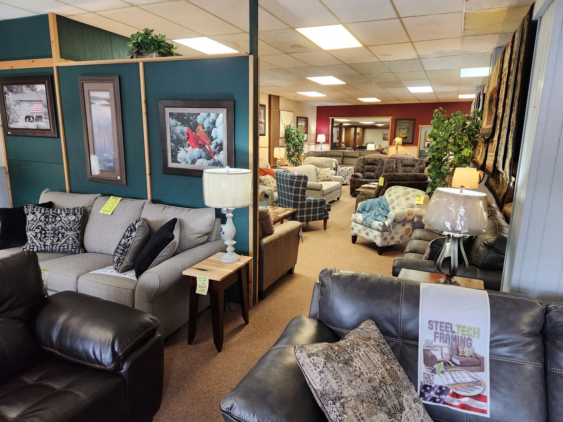 A furniture store filled with lots of furniture and lamps.