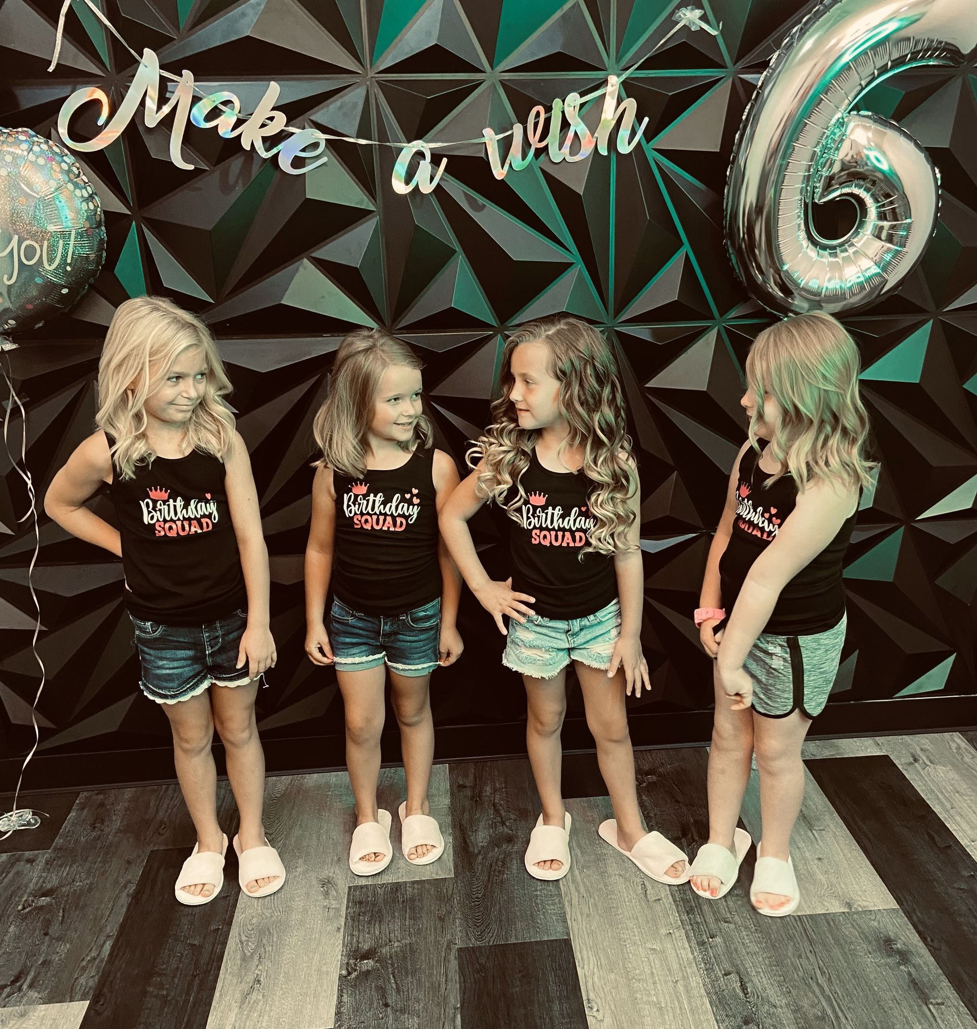 Four girls wearing their Birthday Squad uniform