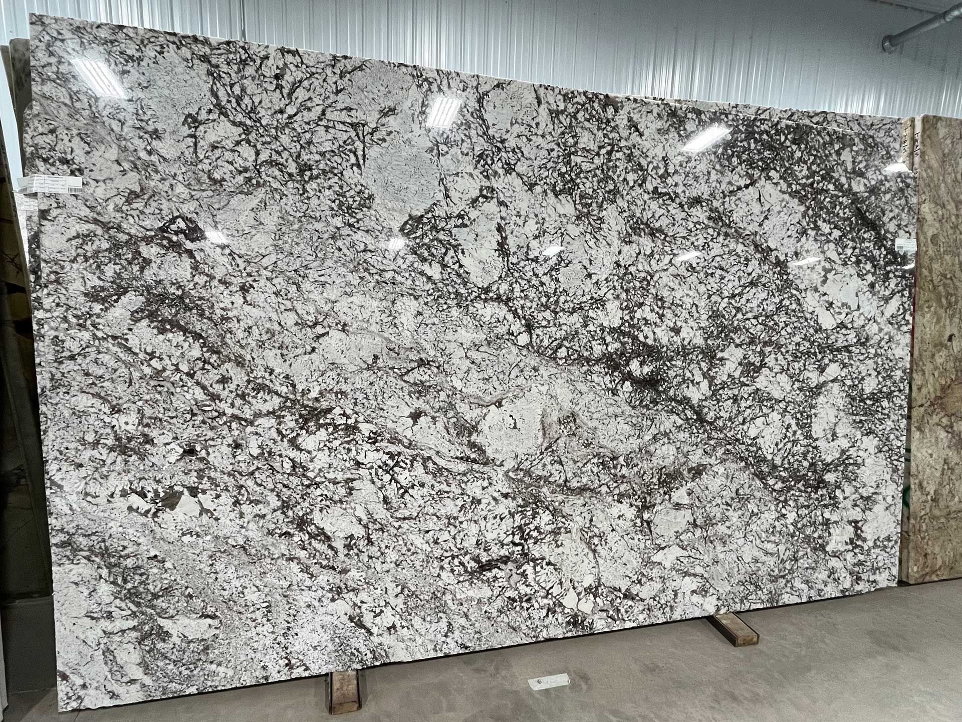 white normandy polished granite