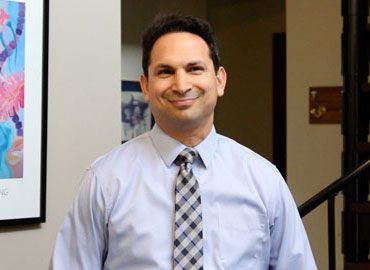 Photo of {{Team Member Name}}