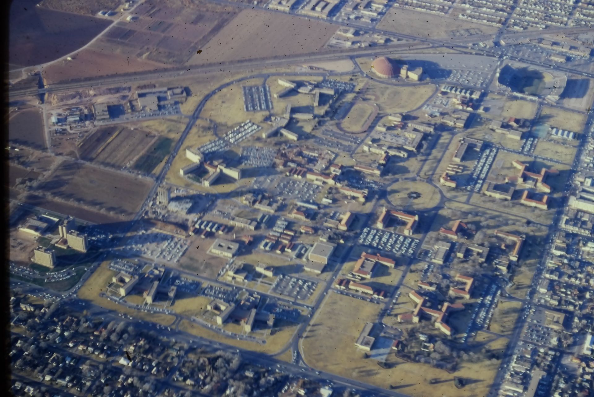 An aerial view of a city with lots of buildings