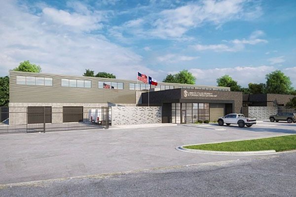 An artist 's impression of a building with cars parked in front of it.