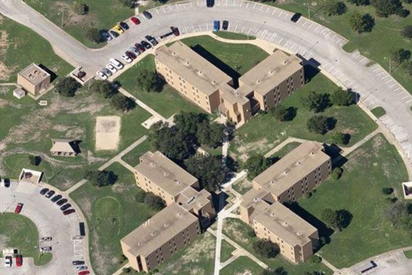 An aerial view of a residential area with lots of buildings