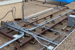 There are a lot of pipes and wires on the ground.