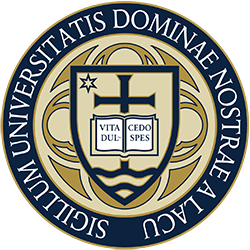 Seal of University of Notre Dame: gold and blue, with a cross, book, and Latin text, within a circular frame.