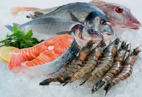 Salmons and shrimps on ice