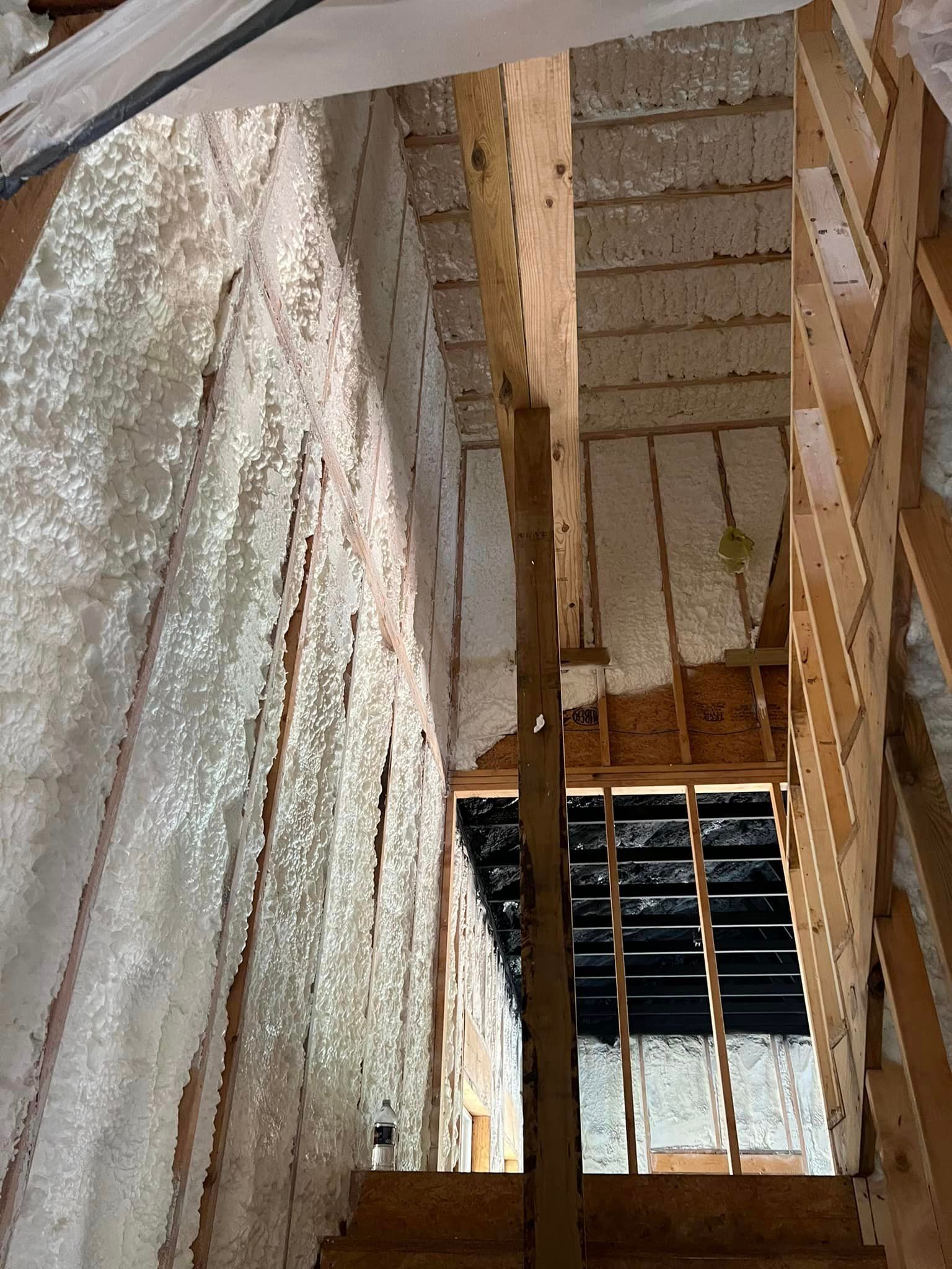 looking up at a staircase with foam on the walls and ceiling .