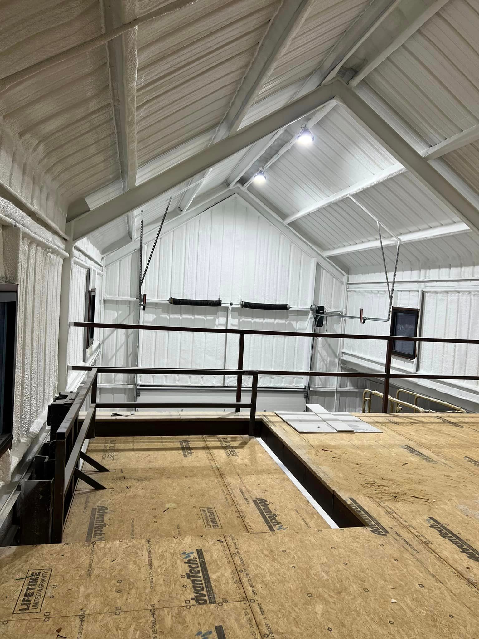 the inside of a building with a ceiling that is very high .