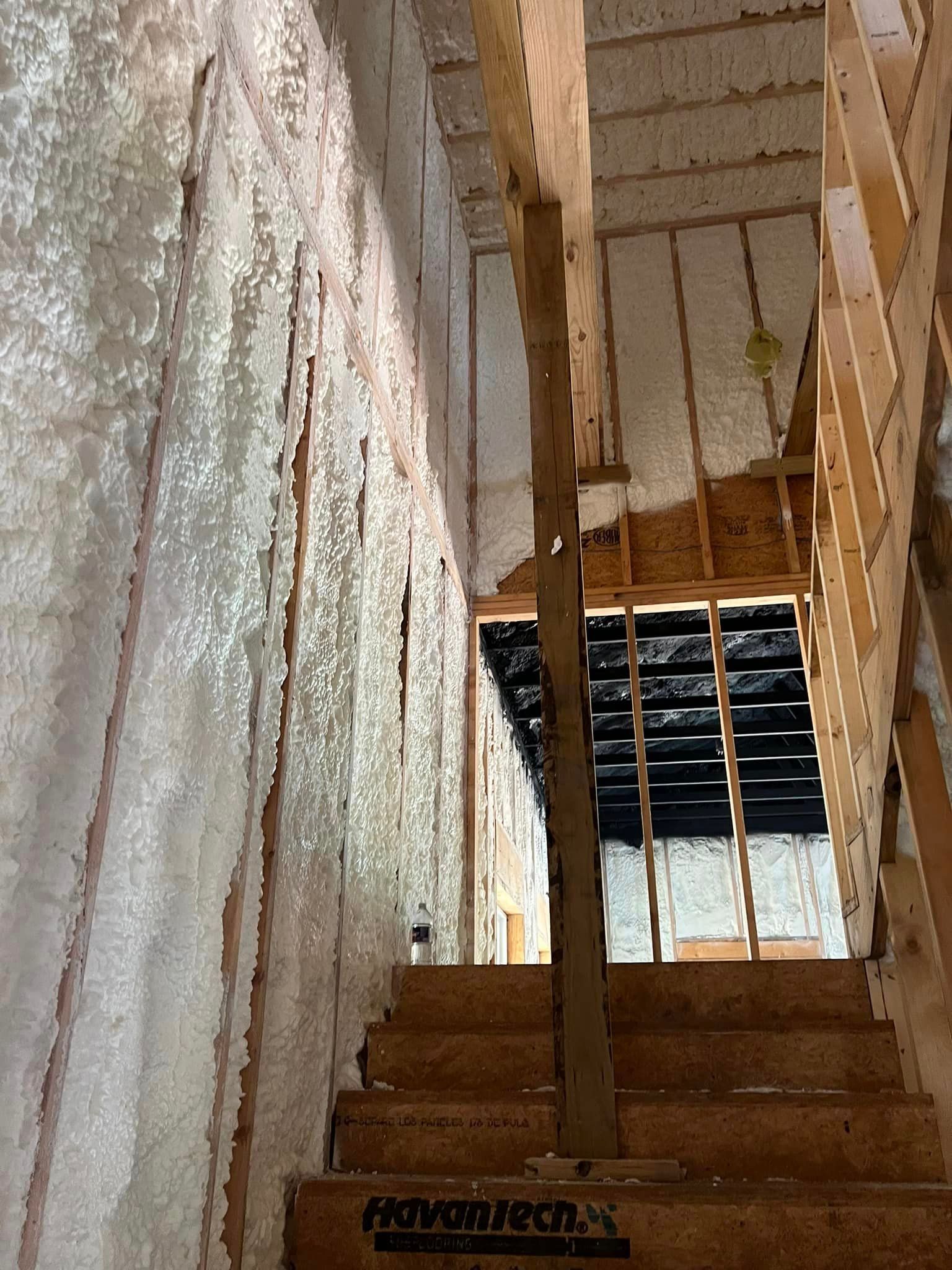 a set of stairs leading up to a building under construction .