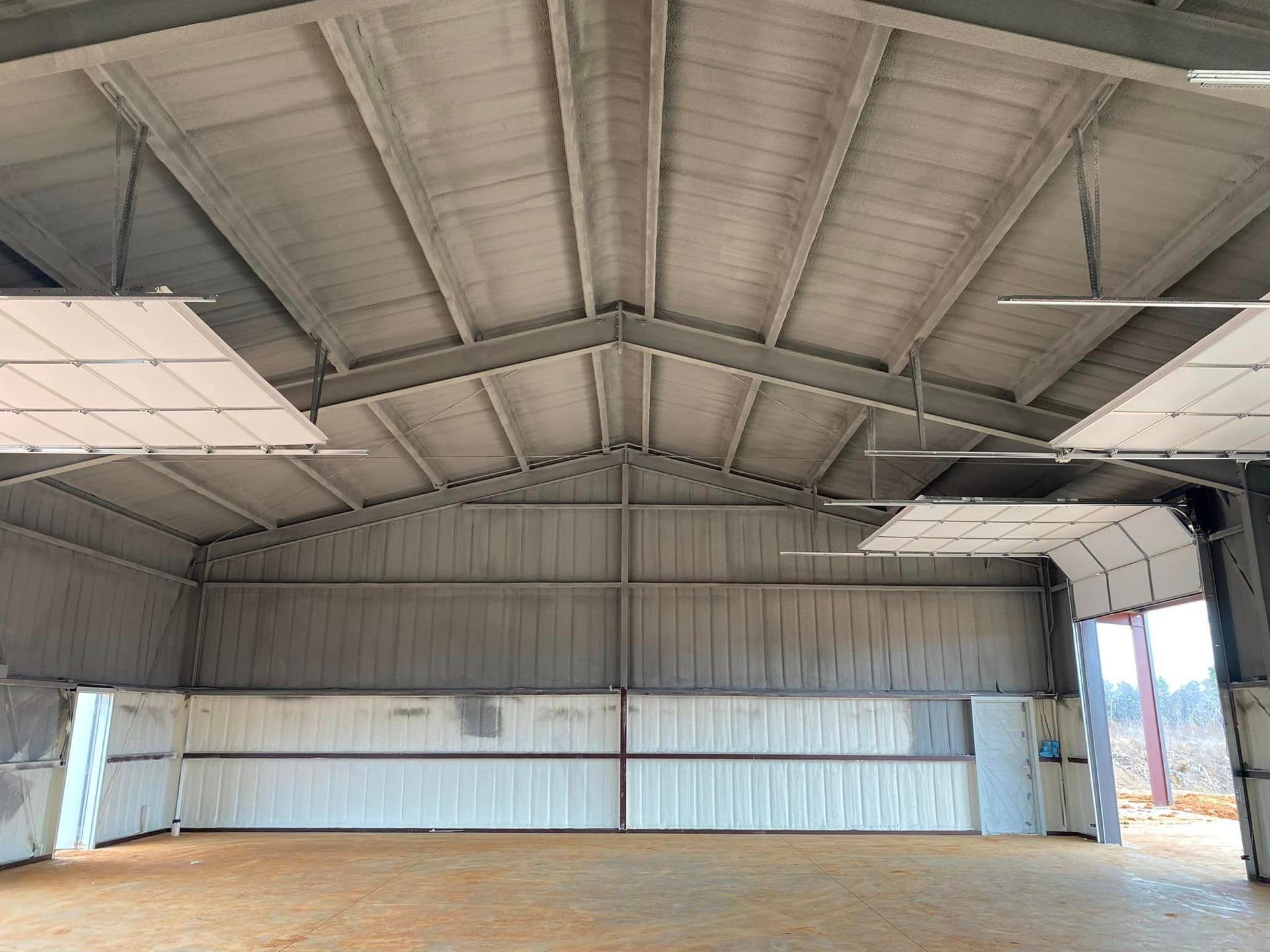 the inside of a large building with a ceiling that is very high .