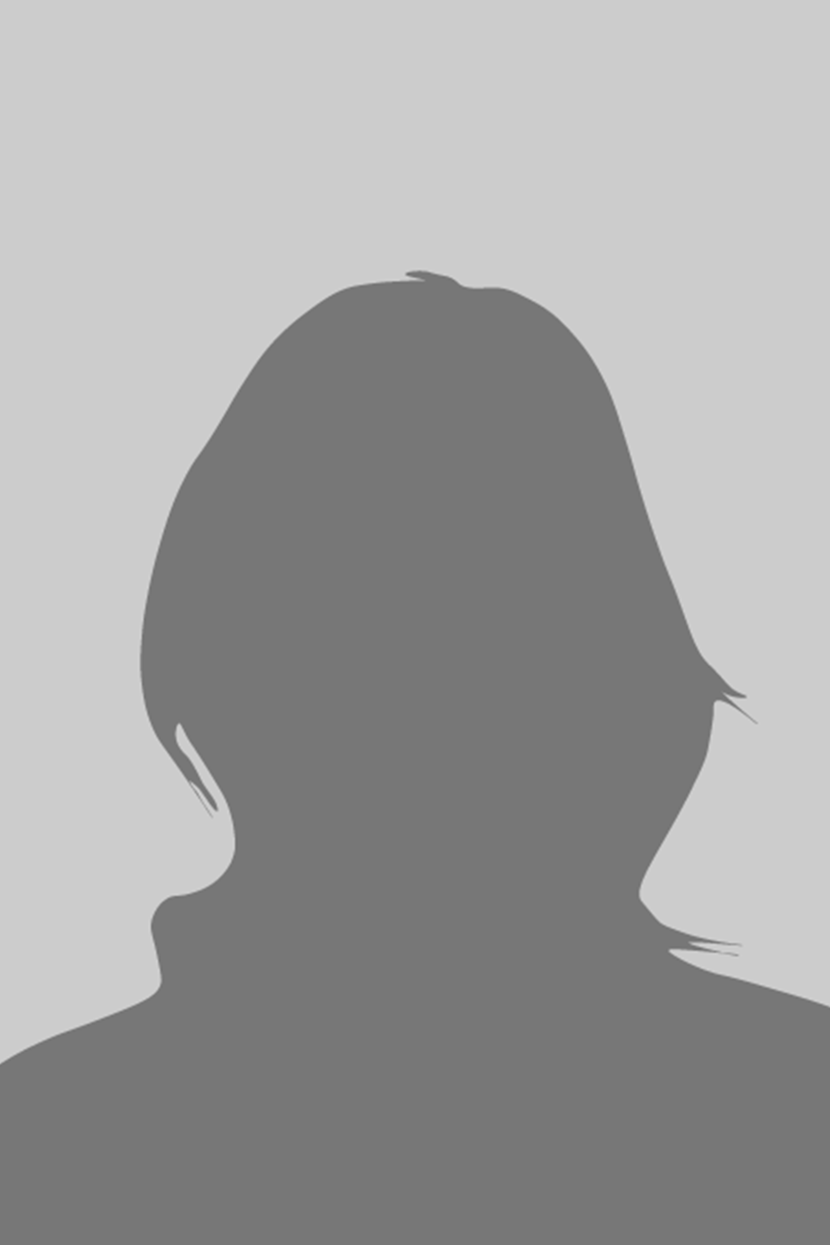 Silhouette of a person with short hair, against a gray background.