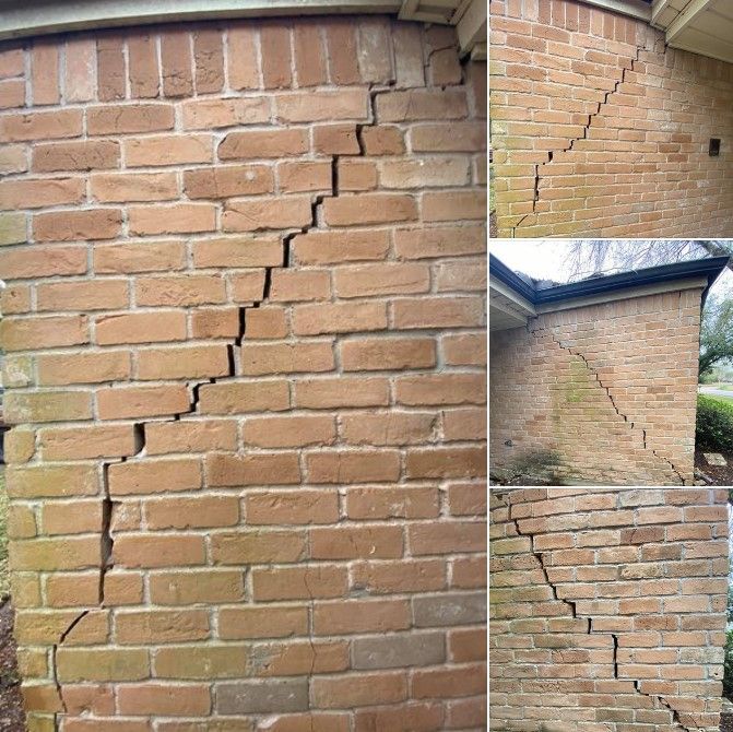 A brick wall with cracks in it and a roof