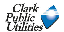 Clark Public Utilities logo: black text on white, blue diamond with lines and white glow.