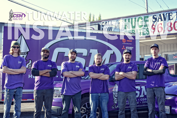 Six men in purple shirts pose with arms crossed in front of a CSN Turnwater truck.
