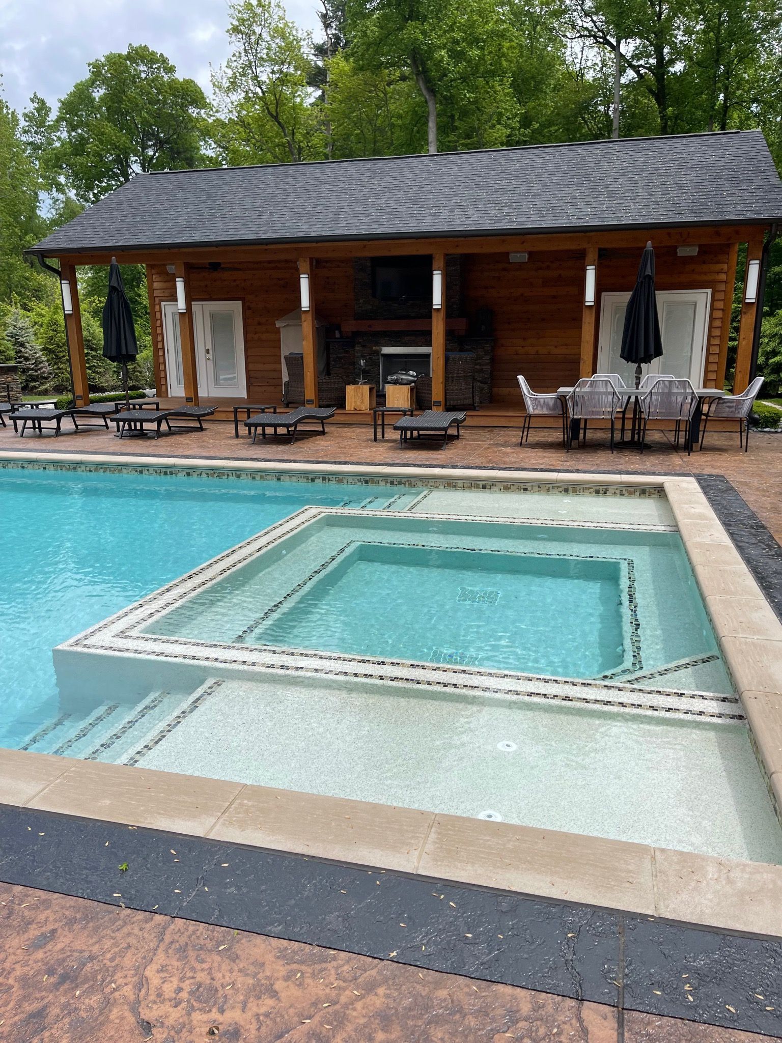 swimming pool with patio