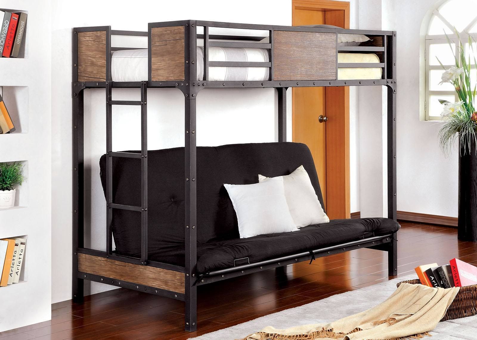 Metal bunk bed with futon. Dark frame, wood accents. Black futon with white pillows. Indoor setting.