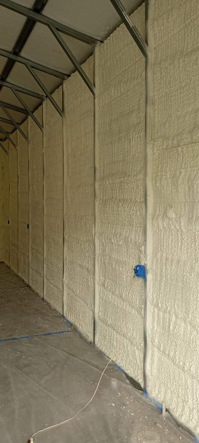 A garage with a lot of insulation on the walls.