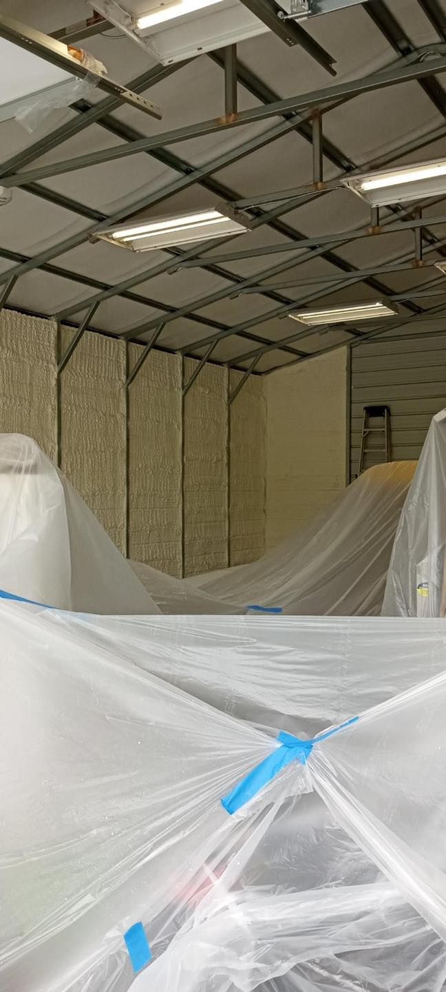 A large room with a lot of plastic covering it.