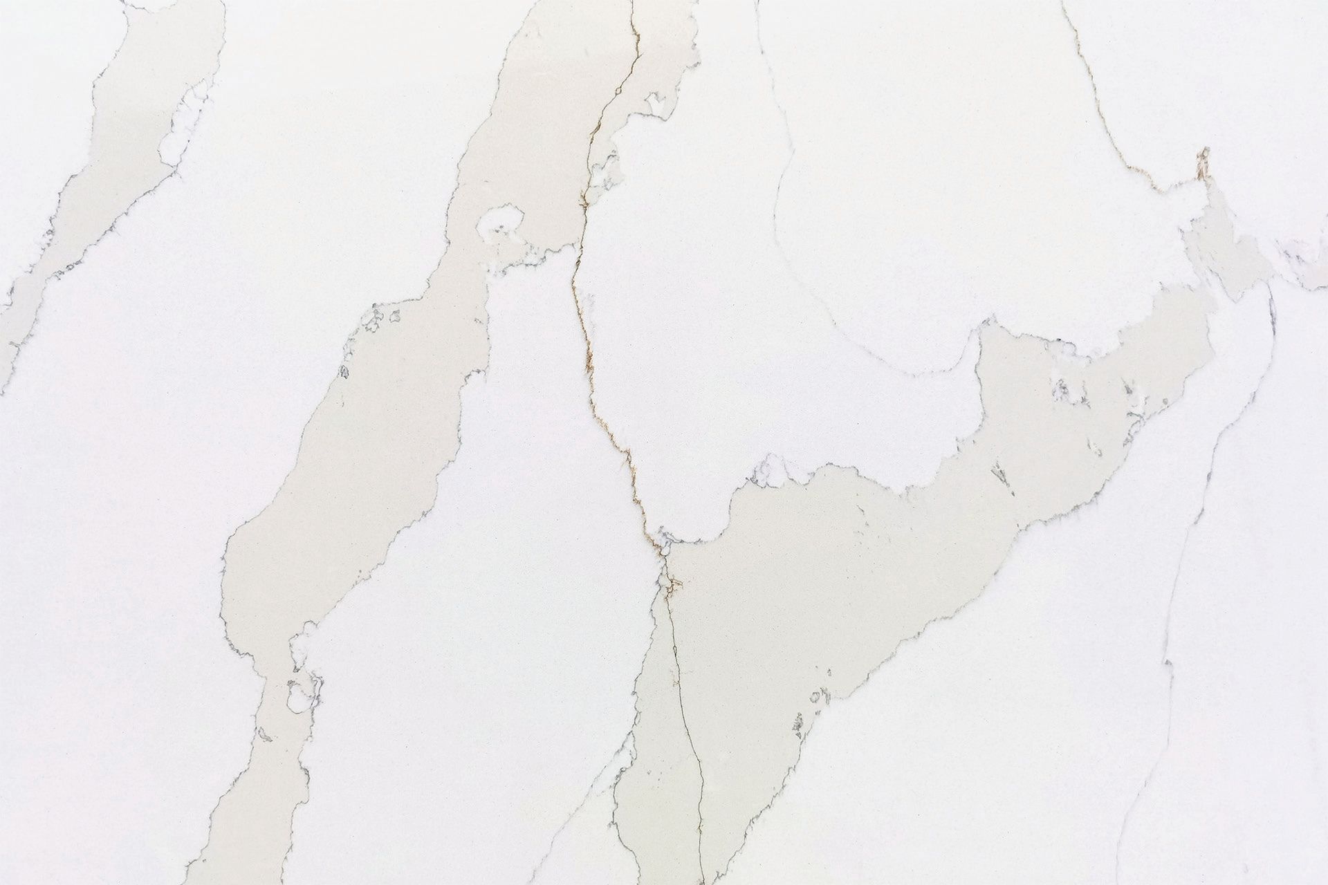 White marble surface with subtle gray veining and pale beige streaks