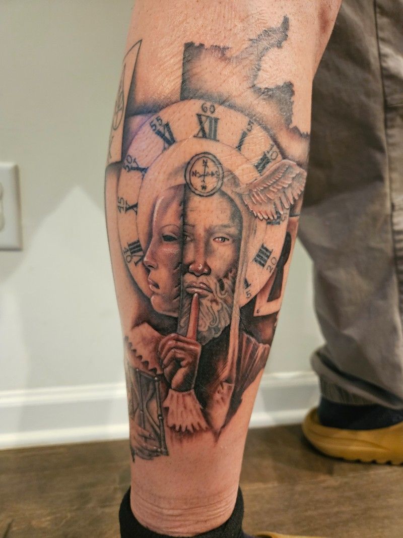 A person has a tattoo of a man with a beard and a clock on their leg.