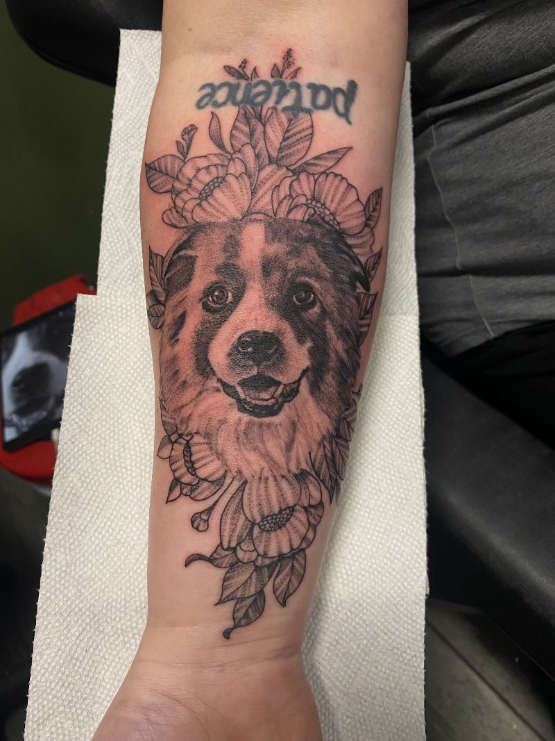 A tattoo of a dog with the word patience on it