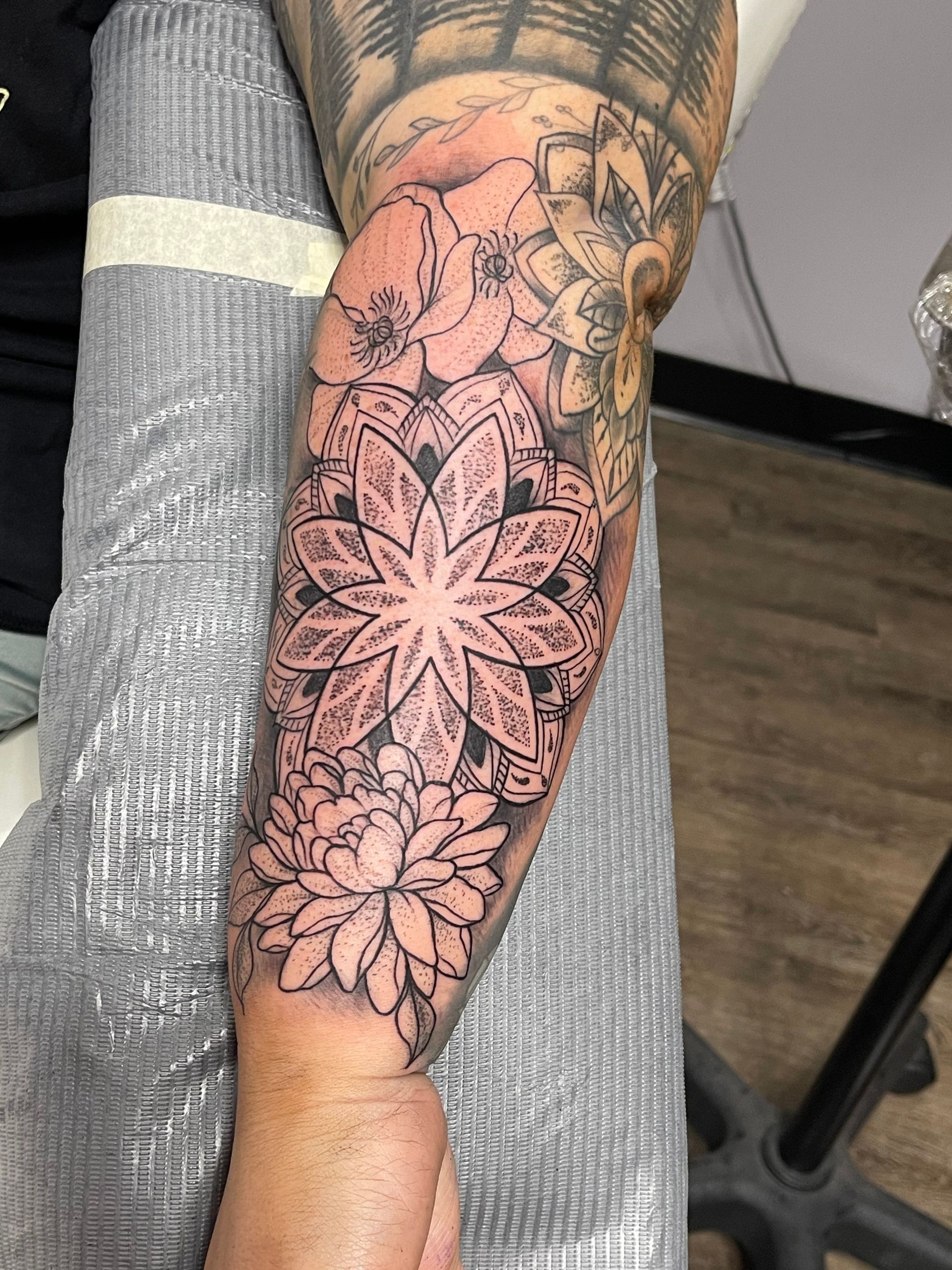 A close up of a tattoo on a person 's arm