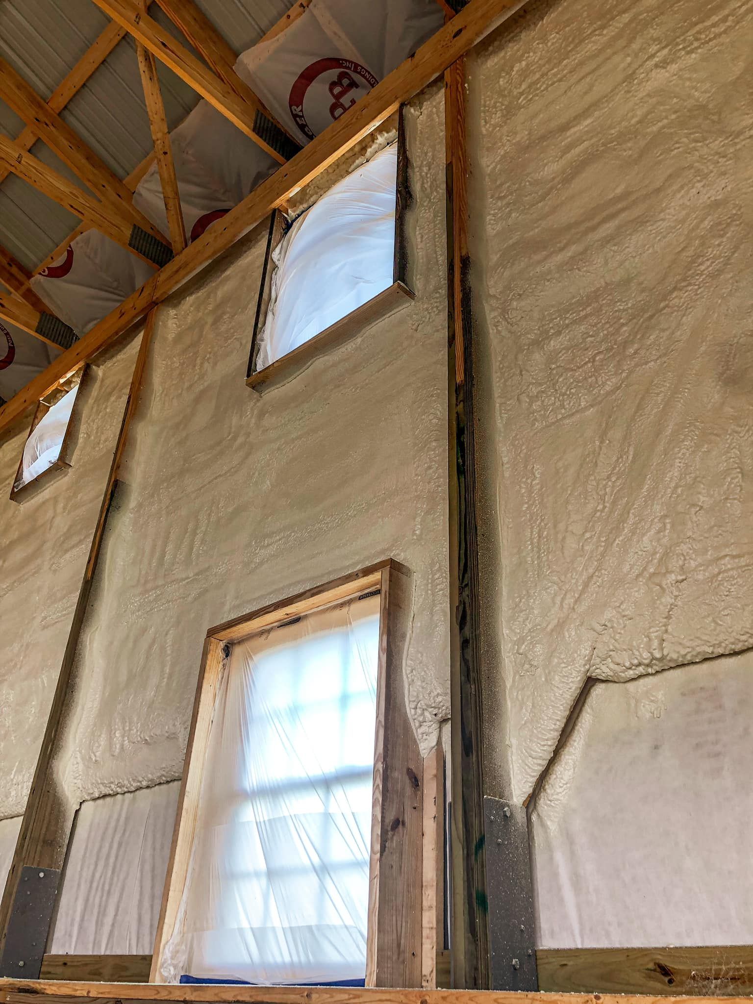 A building with a lot of windows and foam on the walls.