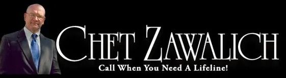 Man in suit. Name is Chet Zawalich. "Call When You Need A Lifeline!" text below.