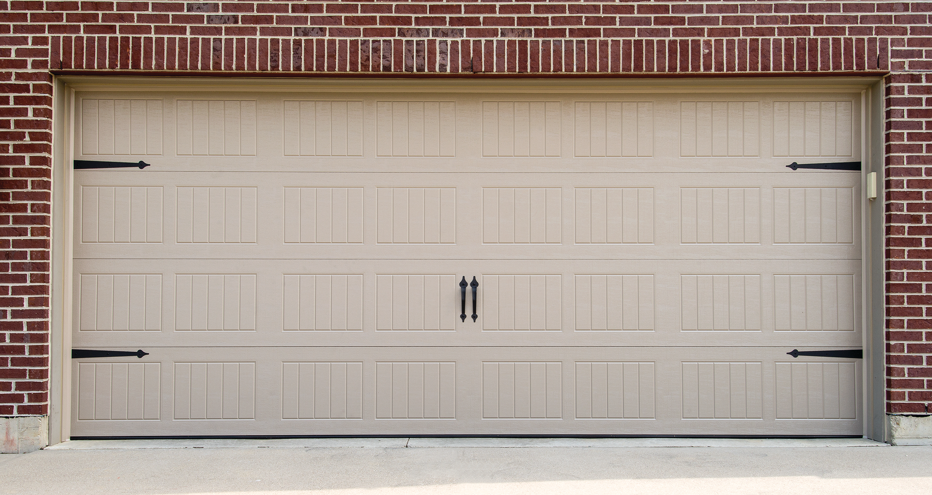 A white garage door with the number 11 on it