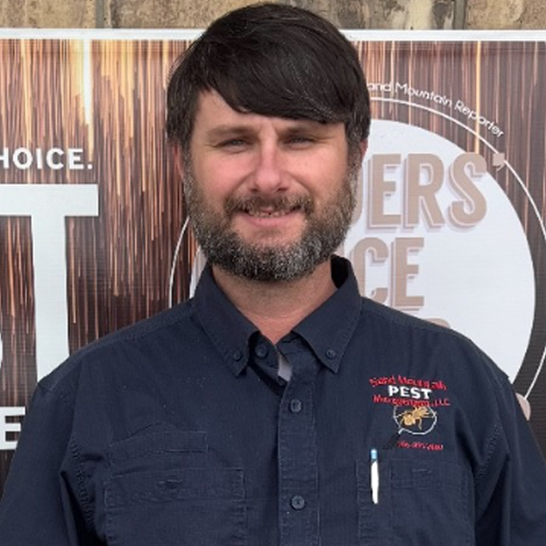 Man with beard, blue shirt, 