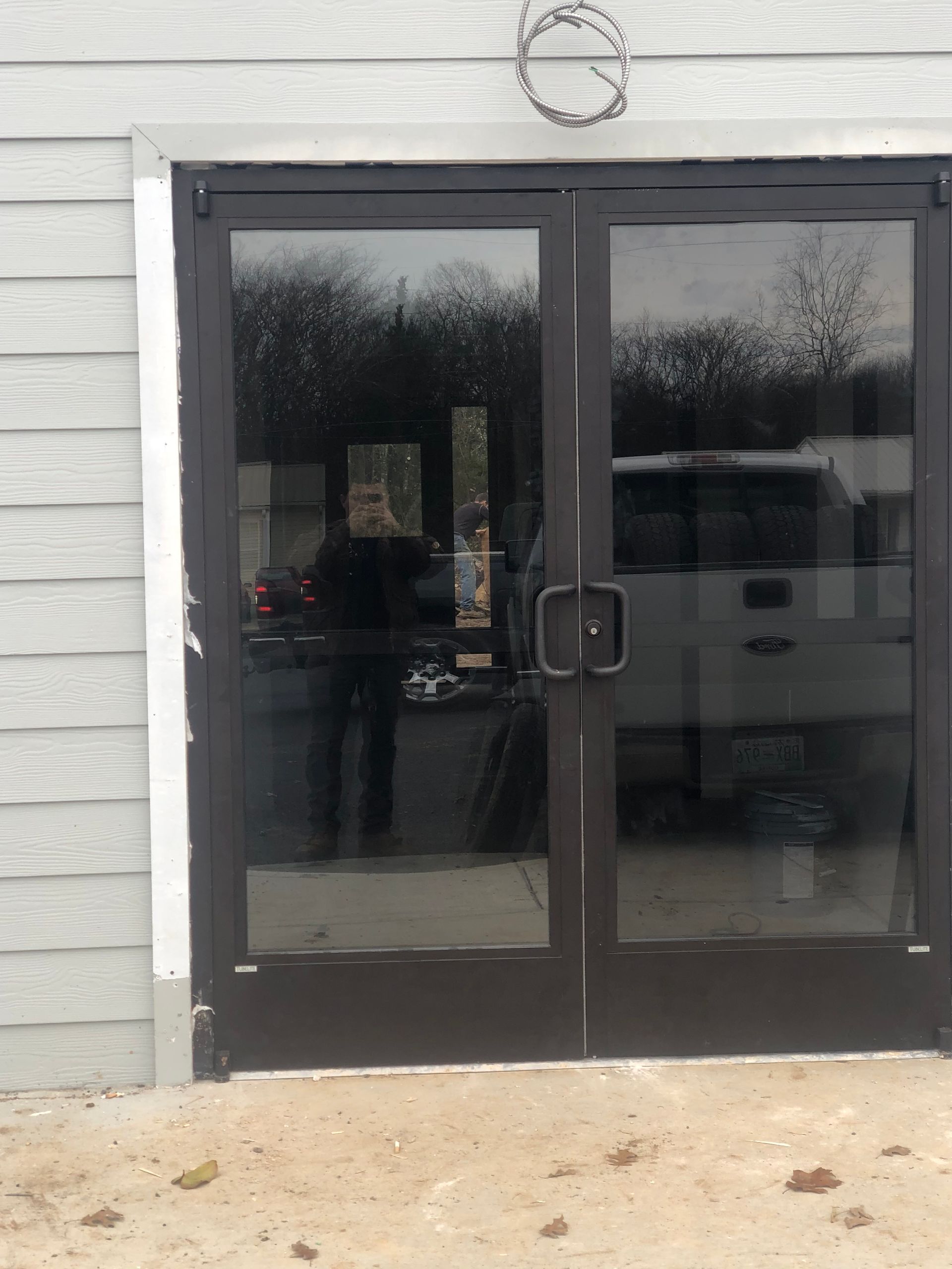 Storefront glass door