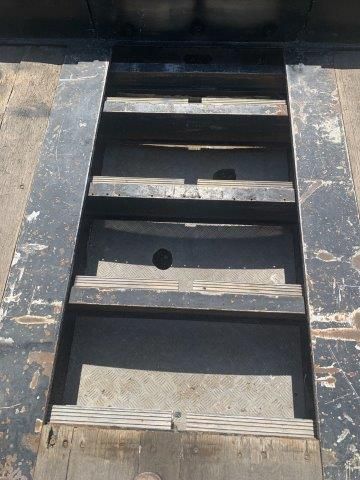 A set of stairs with a hole in the middle.