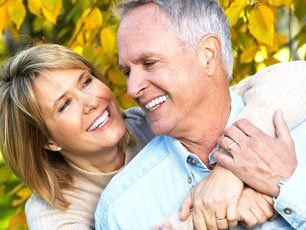 Learn more about root canals and periodontal Happy aged couples