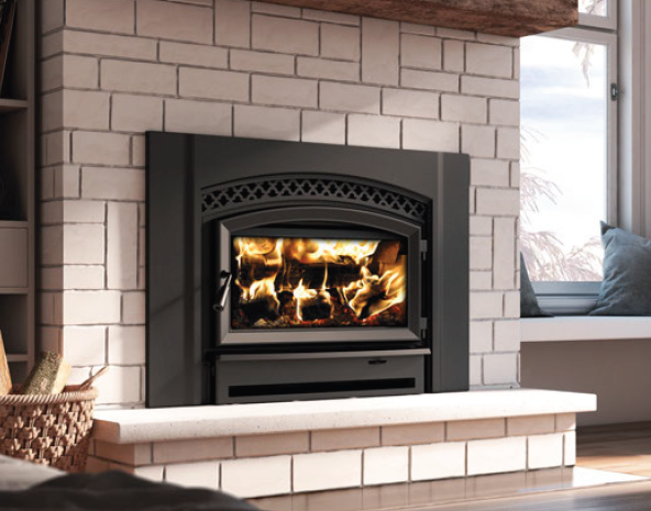 Modern black fireplace insert with a burning fire in a tiled living room under a window