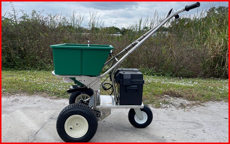 Electric fertilizer spreader left view