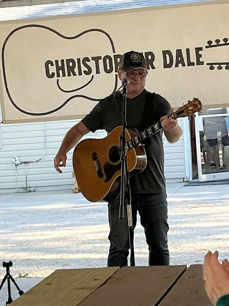 Man playing guitar on stage