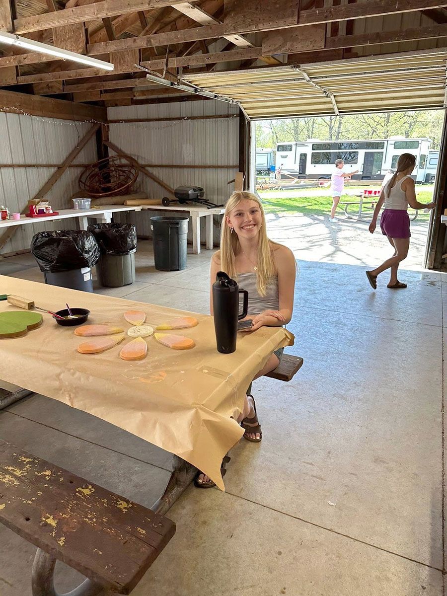 Woman seated smiling