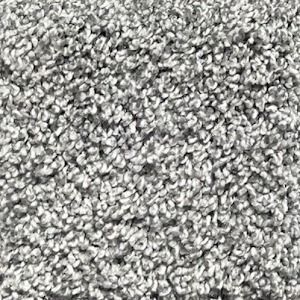 Close-up of gray, textured carpet with a looped pile.
