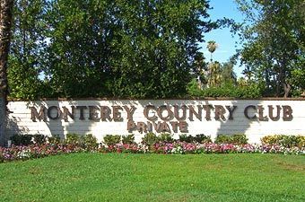 A sign that says monterey country club on it