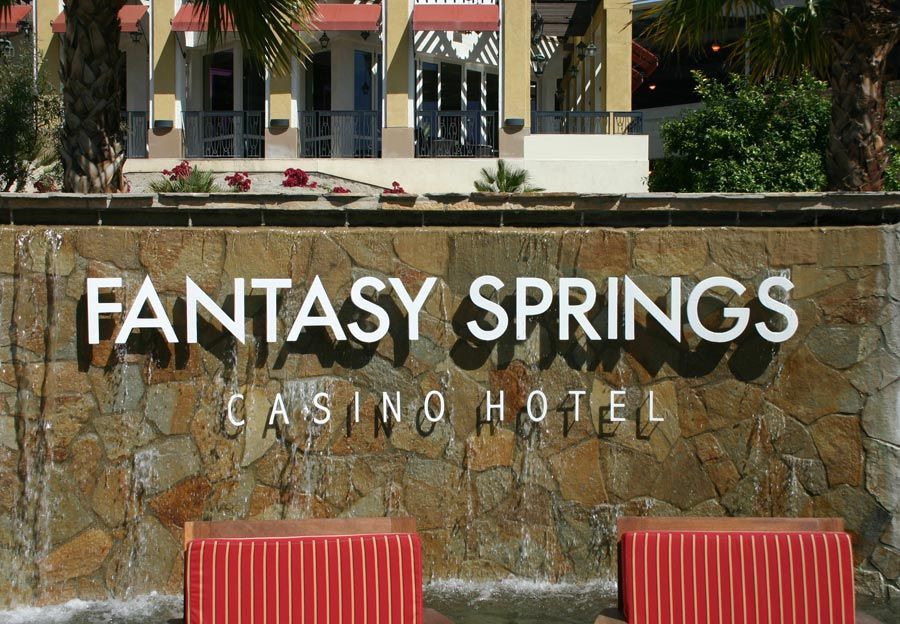 A sign for the fantasy springs casino hotel